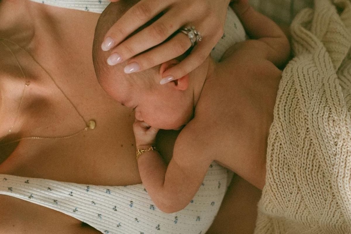 Mother holding newborn
